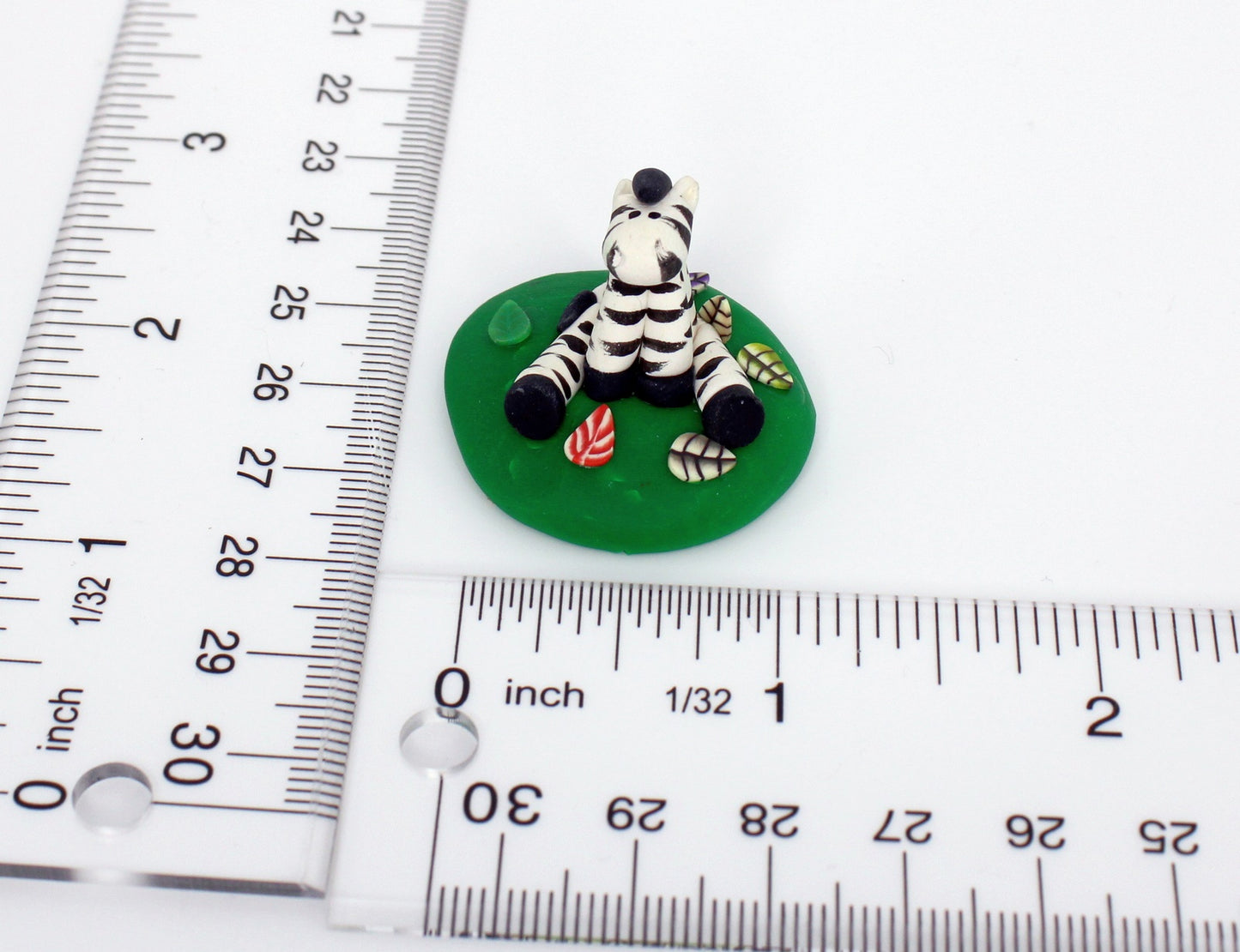 Zebra Sitting on Grass